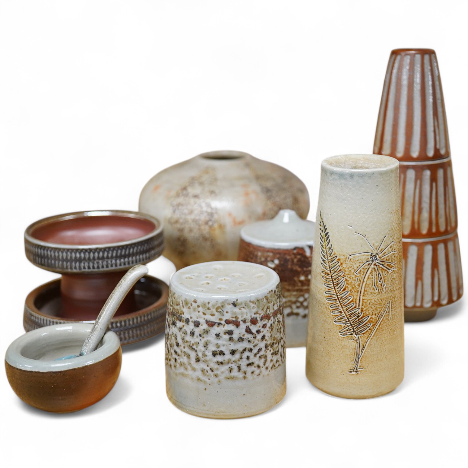 Guy Sydenham (1916-2005), a three piece cruet set, salt and pepper mustard and spoon, two vases and a candle-holder, tallest 16cm